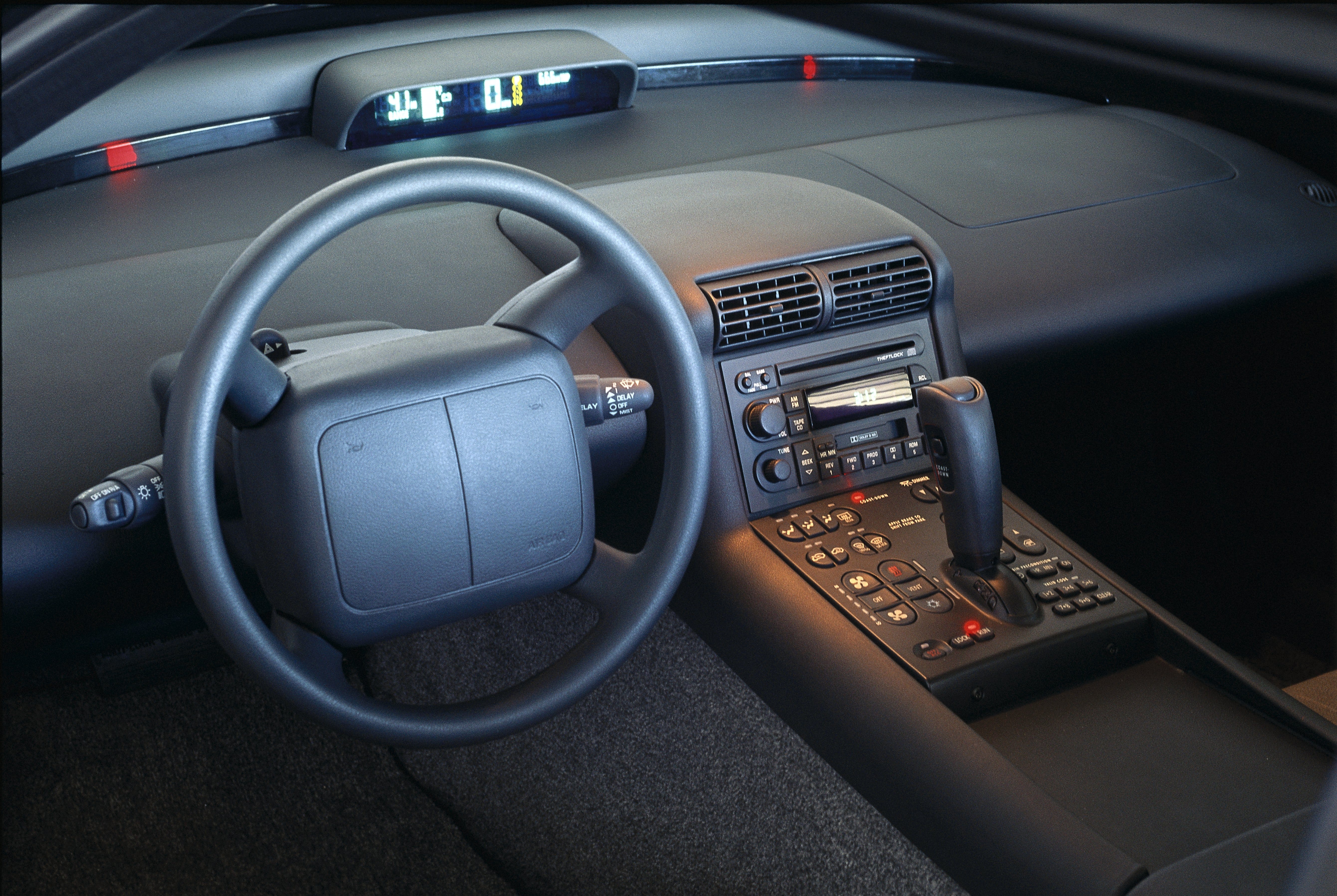 EV1 interior — climate control, power features, keypad entry